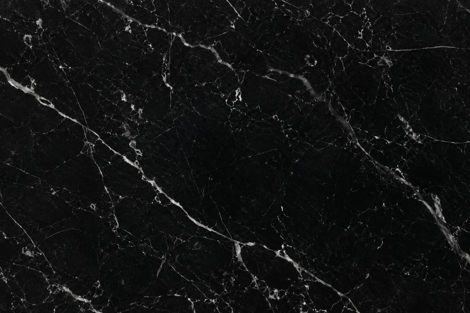 Black marble surface with fine white veining