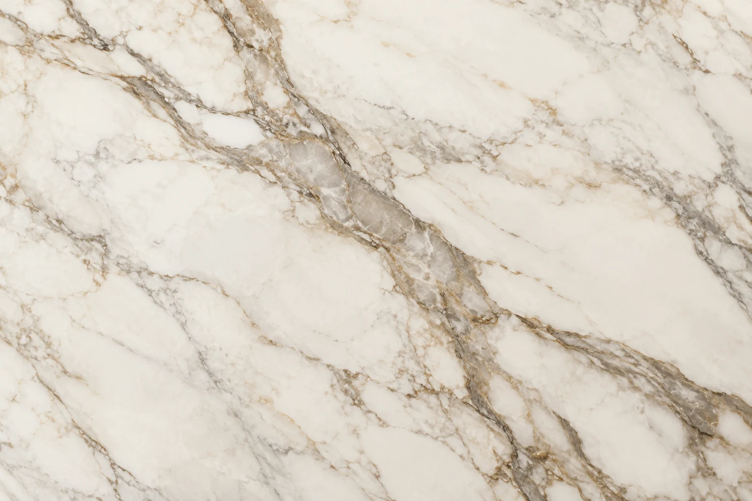 White marble surface with broad gray and warm gold veining