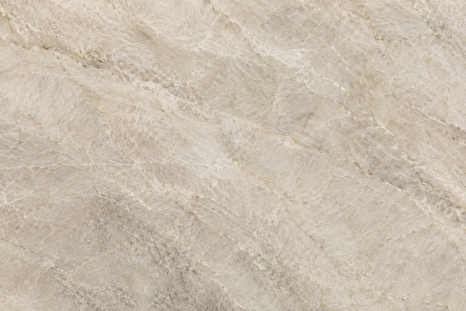 Warm cream quartzite with subtle champagne and gray mineral movement