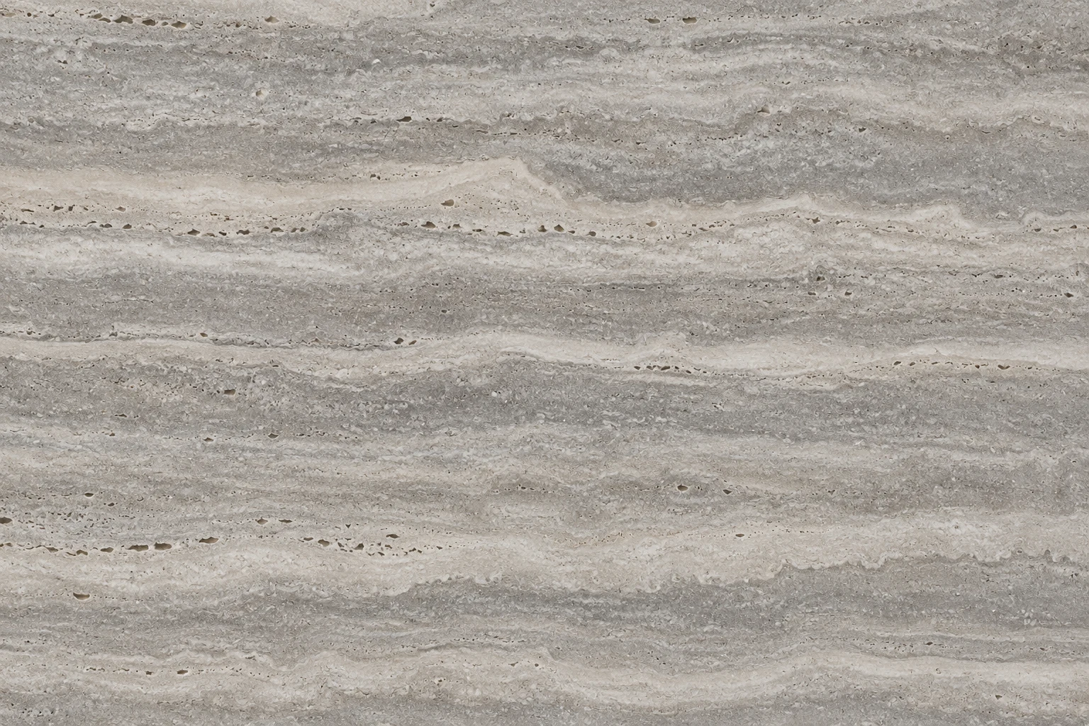 Silver travertine surface with layered gray, taupe, and cream tones